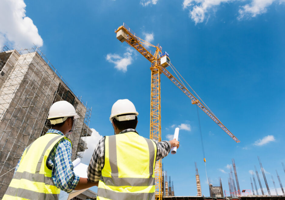 Construction,Engineers,Discussion,With,Architects,At,Construction,Site,Or,Building